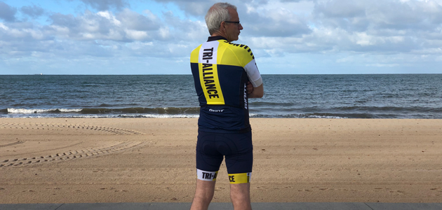 Michael wearing his Tri Alliance kit at Elwood Beach