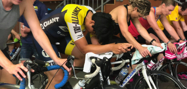Tri Alliance athlete completing an FTP test on an indoor bike trainer