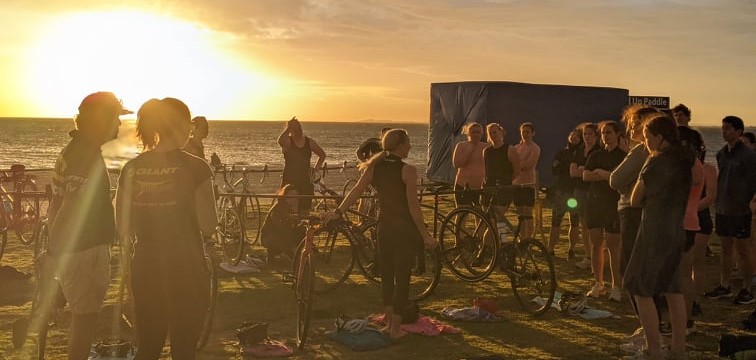 Tri Alliance athletes finishing an Elwood combo session at sunset